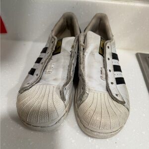 White and Black adidas 13c